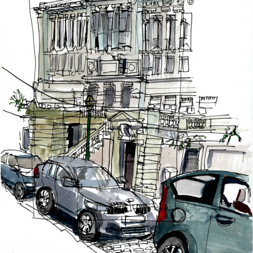 Sketch of a street with parked cars in front of Palace of Justice in Brussels. The structure has ornate details, large windows, and columns. The drawing is in pen and watercolor, giving it an artistic feel.