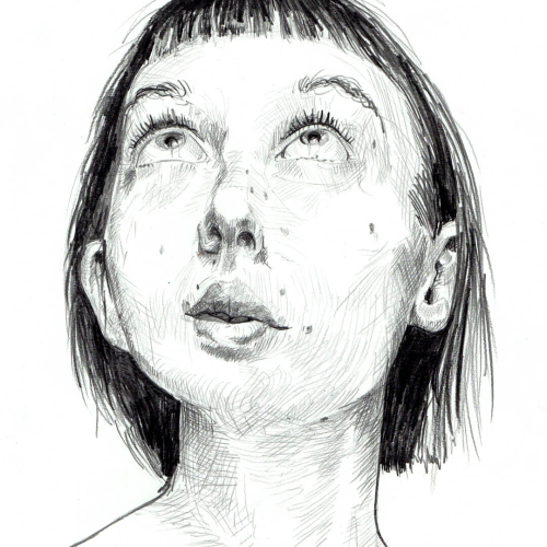 Pencil sketch of a woman with short hair and bangs, looking upward. The drawing features detailed shading and line work, highlighting her facial features and expression of wonder or contemplation against a plain white background.