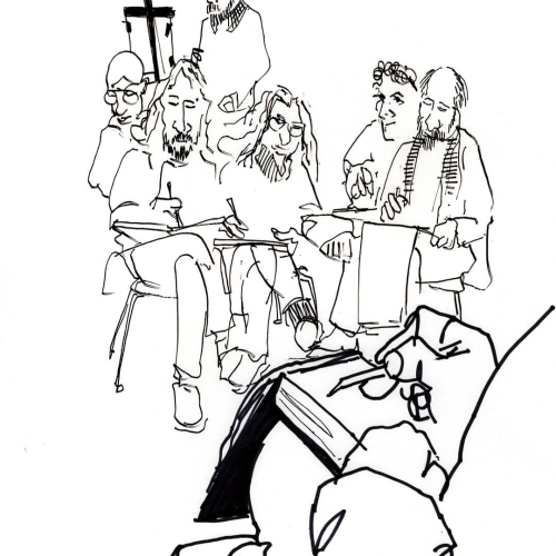 Ink drawing of people sitting and sketching, with some looking down at sketchpads. A prominent hand in the foreground holds a pen over paper, while an easel is visible in the background. The style is sketchy and expressive.
